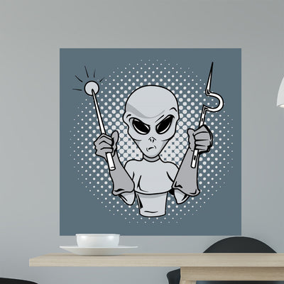 Alien Surgeon shown on a wall