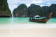 Fishing boat on Thailand beach Wall Mural