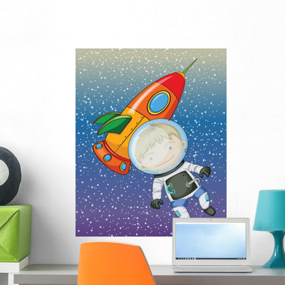 Boy and Rocket Wall Mural shown on a wall