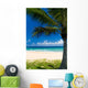 Palm tree on a tropical beach Wall Mural