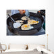 Oysters Fried in Egg Batter Being Cooked Wall Mural