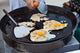 Oysters Fried in Egg Batter Being Cooked Wall Mural