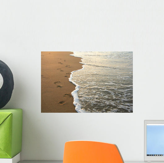 footprints on the beach Wall Mural