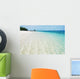 Deserted tropical beach with blue sky Wall Mural
