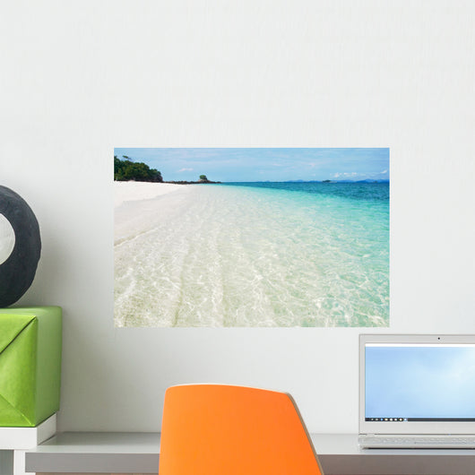 Deserted tropical beach with blue sky Wall Mural