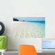 Deserted tropical beach with blue sky Wall Mural