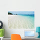 Deserted tropical beach with blue sky Wall Mural
