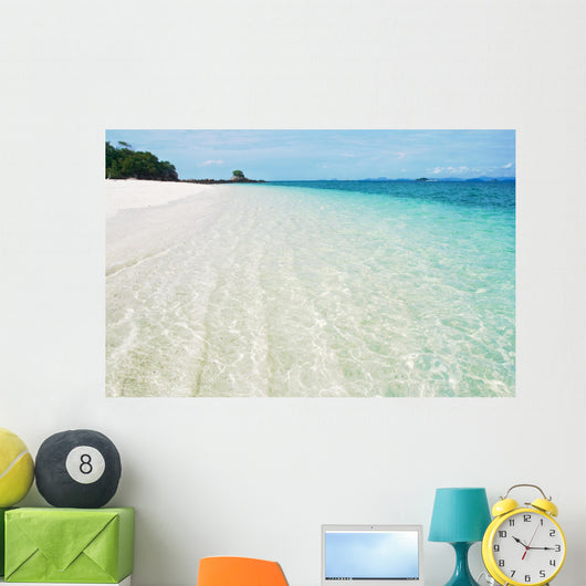 Deserted tropical beach with blue sky Wall Mural