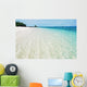 Deserted tropical beach with blue sky Wall Mural