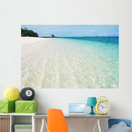 Deserted tropical beach with blue sky Wall Mural