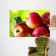 ripe red apples on table Wall Mural