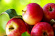 ripe red apples on table Wall Mural
