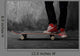 Legs in sneakers on a skateboard Wall Mural