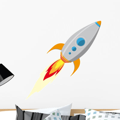Rocket Ship Wall Decal shown on a wall