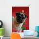 Pug in Front of a Christmas Tree Wall Mural