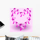 Heart shape made by pink awareness ribbons Wall Mural