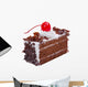 Chocolate cake topping with mousse chocolates ships and cherry o Wall Decal
