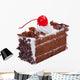 Chocolate cake topping with mousse chocolates ships and cherry o Wall Decal