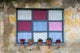 Old romantic windows with flowerpots Wall Mural