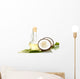 decanter with coconut oil and coconuts isolated on white Wall Decal