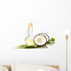 decanter with coconut oil and coconuts isolated on white Wall Decal