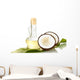 decanter with coconut oil and coconuts isolated on white Wall Decal