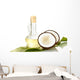 decanter with coconut oil and coconuts isolated on white Wall Decal