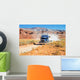 Semi-truck driving across the desert Wall Mural