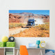 Semi-truck driving across the desert Wall Mural