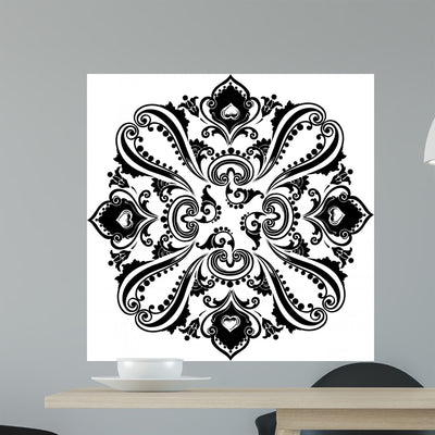 Abstract Black Floral Swirling Wall Decal shown on a wall