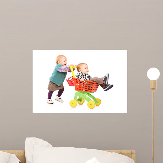 Toddler Girl Pushing Her