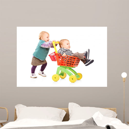 Toddler Girl Pushing Her