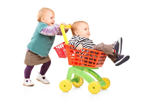 Toddler Girl Pushing Her