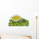 Olive oil in a bowl with fresh green olives Wall Mural