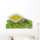 Olive oil in a bowl with fresh green olives Wall Mural