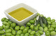 Olive oil in a bowl with fresh green olives Wall Mural