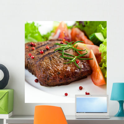 Delicious Meat shown on a wall