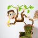 Monkey swinging with banana Wall Decal