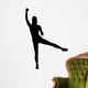 A silhouette of an attractive woman lifting weights Wall Decal