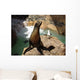 Sea lion with seagull in Seaworld in San Diego while sunbathing Wall Mural
