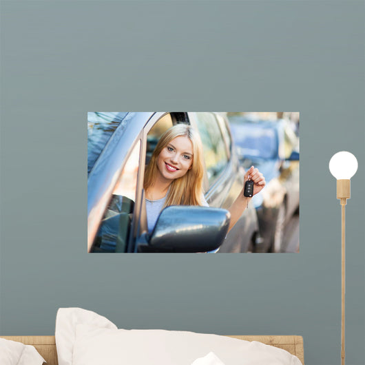 Young Woman Showing Car