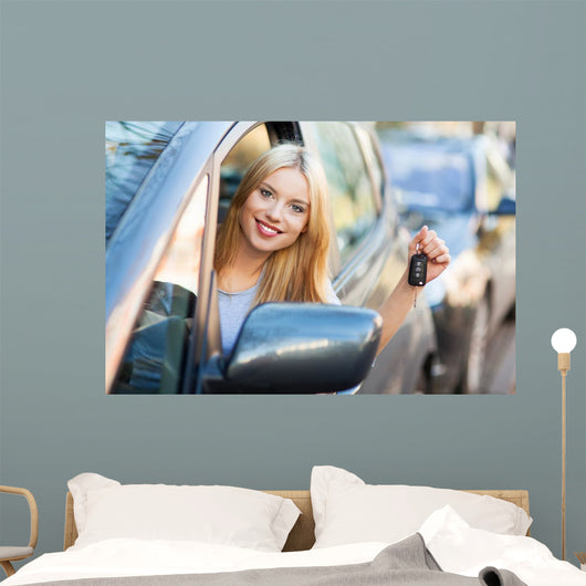 Young Woman Showing Car