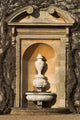 urn inside stone alcove Wall Mural