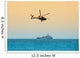 helicopter hovering over battleship Wall Mural