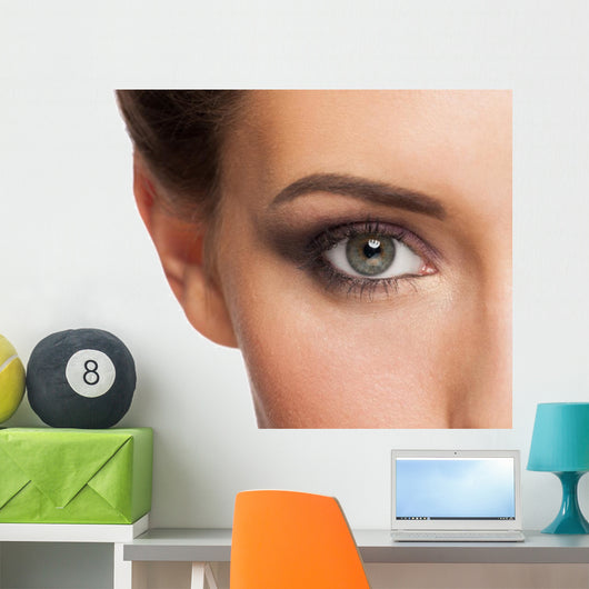 Woman eye with makeup Wall Mural