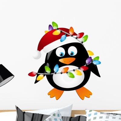 Penguin with Christmas Light Wall Decal shown on a wall