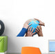 Teamwok concept with hands on globe Wall Decal
