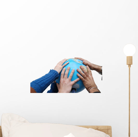 Teamwok concept with hands on globe Wall Decal