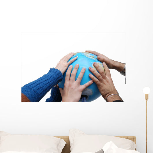 Teamwok concept with hands on globe Wall Decal