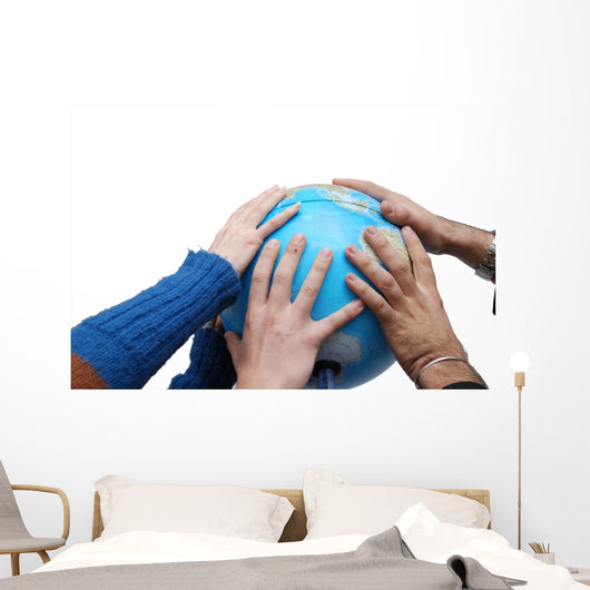 Teamwok concept with hands on globe Wall Decal